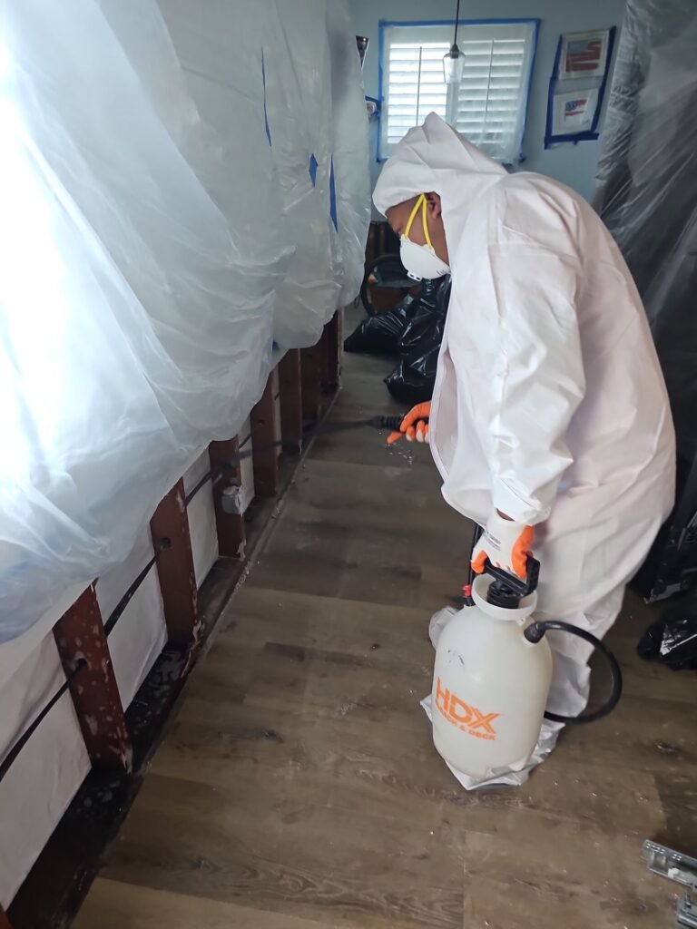 Antimicrobial treatment applied in a sealed hallway after a sewage backup